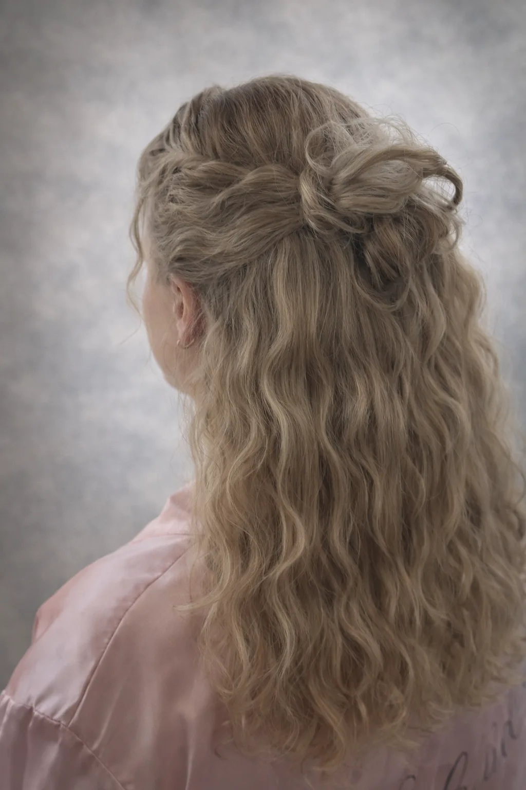 Blonde half-up with bow detail